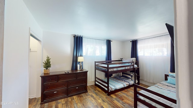 bedroom featuring hardwood / wood-style flooring