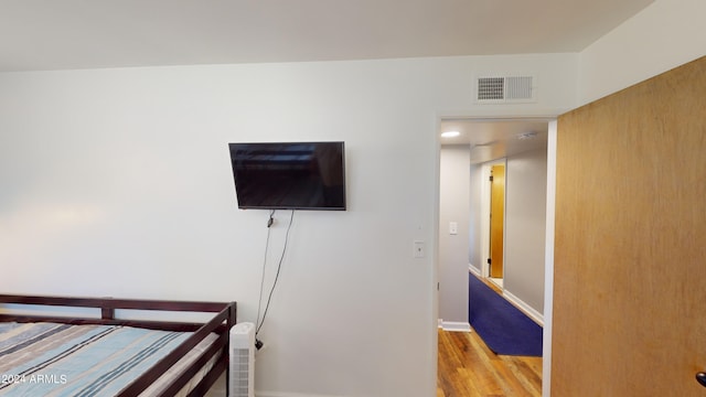 bedroom featuring light wood-type flooring