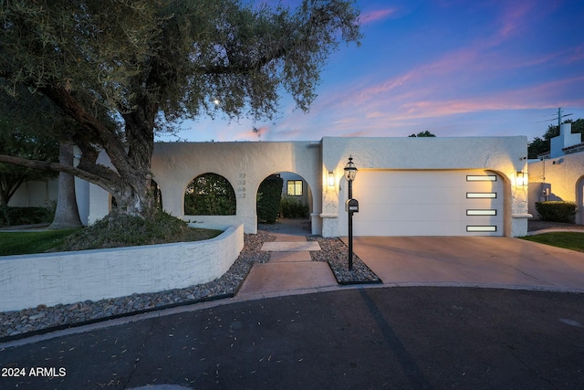 view of front facade featuring a garage