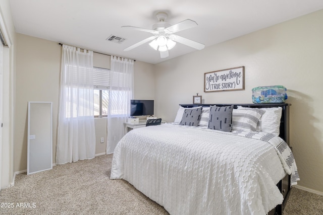 carpeted bedroom with ceiling fan