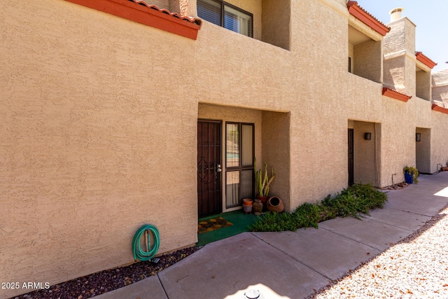 1401 E Puget Ave Unit 10, Phoenix, AZ 85020 - property entrance with stucco siding and a tile roof