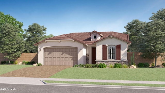 mediterranean / spanish home with stone siding, a tile roof, decorative driveway, and fence