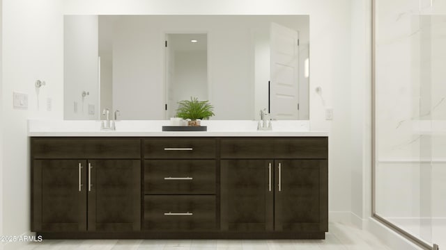 bathroom featuring double vanity, a shower, and a sink