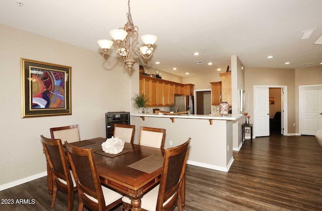 dining area with recessed lighting, baseboards, and dark wood-style flooring