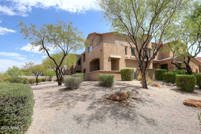 view of front of home featuring stucco siding