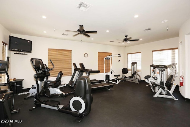 workout area with recessed lighting, visible vents, and ceiling fan