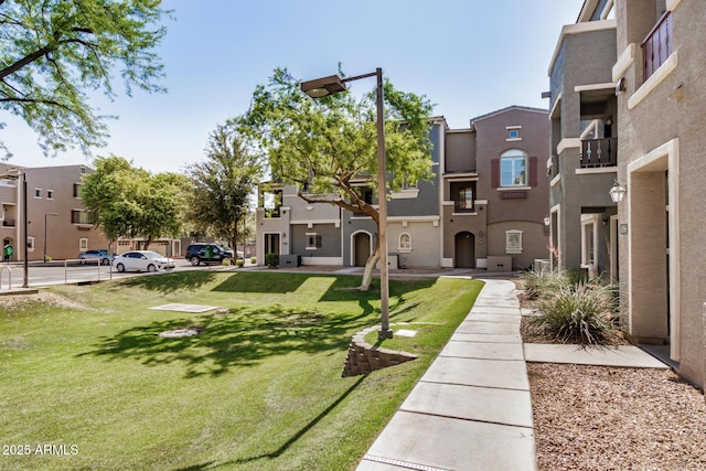 2401 E Rio Salado Pkwy Unit 1048, Tempe, AZ 85288 - view of home's community with a lawn