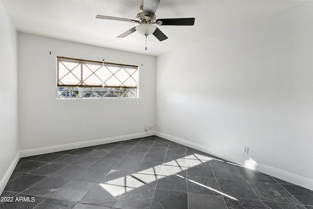 empty room featuring ceiling fan