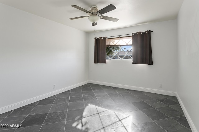 empty room featuring ceiling fan