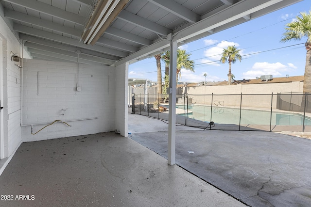 view of patio / terrace featuring a fenced in pool