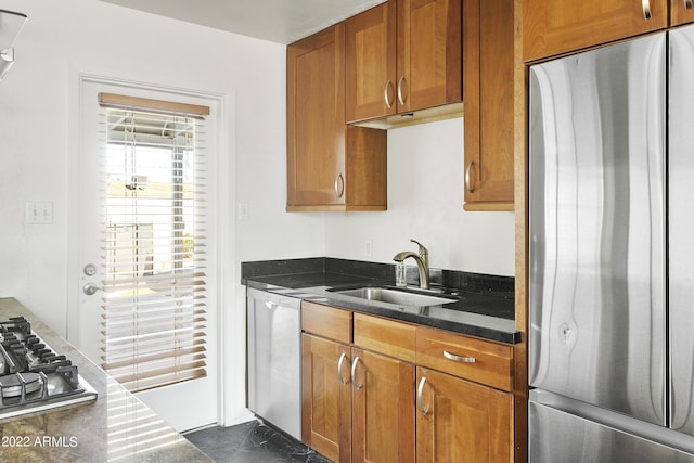 kitchen featuring sink and appliances with stainless steel finishes