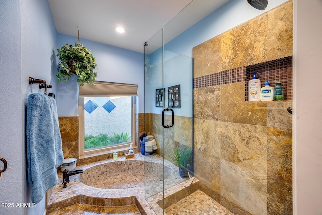 bathroom featuring an enclosed shower