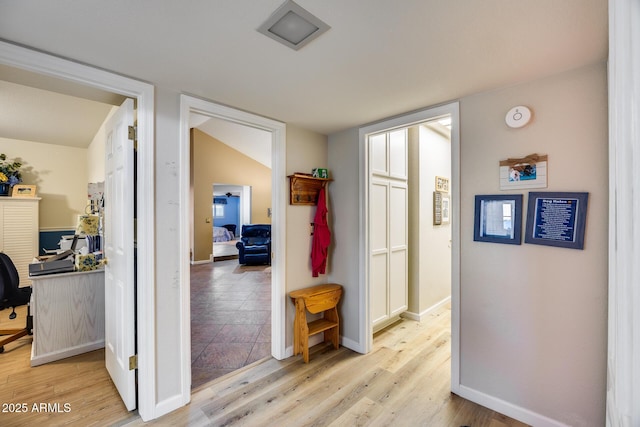 hallway featuring light hardwood / wood-style flooring