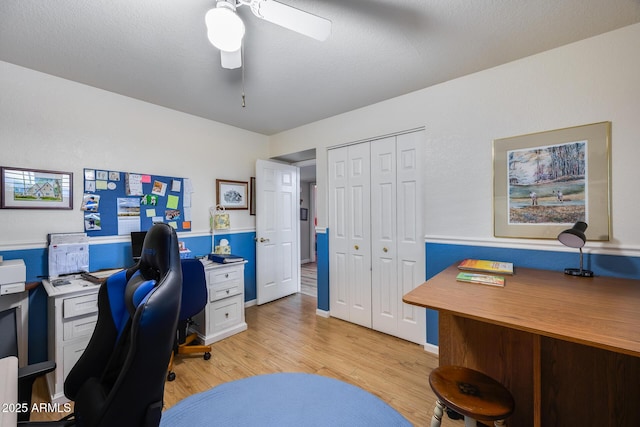 office area with ceiling fan and light wood-type flooring