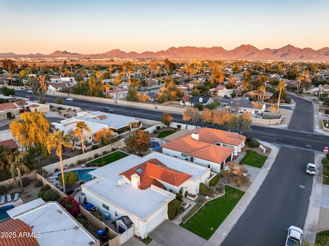 aerial view at dusk with a mountain view