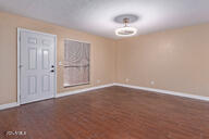 interior space featuring dark wood-type flooring