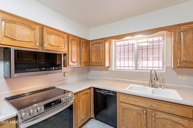 10335 W Mission Ln, Sun City, AZ 85351 - kitchen featuring appliances with stainless steel finishes, light countertops, and a sink