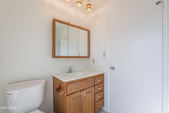 10335 W Mission Ln, Sun City, AZ 85351 - bathroom with toilet and vanity