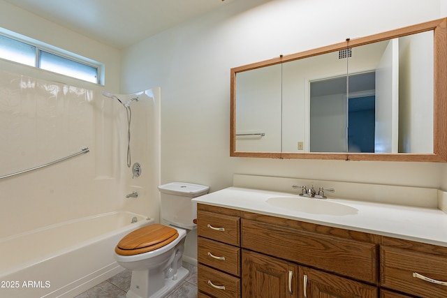 10335 W Mission Ln, Sun City, AZ 85351 - bathroom featuring toilet, vanity, and shower / bathing tub combination