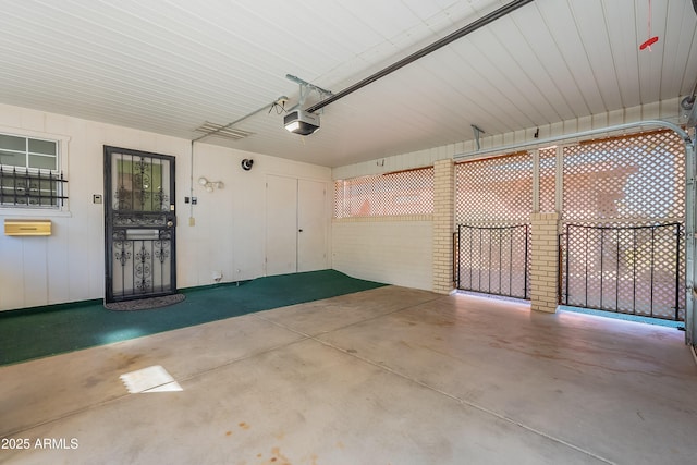 10335 W Mission Ln, Sun City, AZ 85351 - garage with a garage door opener