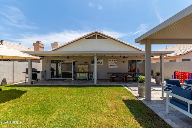 17606 N 2nd Ave, Phoenix, AZ 85023 - rear view of property featuring an outdoor hangout area, ceiling fan, a patio, a chimney, and stucco siding