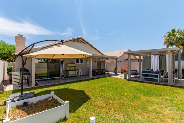 17606 N 2nd Ave, Phoenix, AZ 85023 - back of property featuring outdoor lounge area, a patio area, a chimney, a tiled roof, and stucco siding