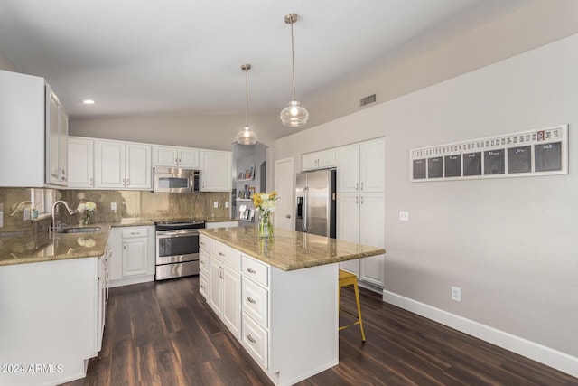 17606 N 2nd Ave, Phoenix, AZ 85023 - kitchen featuring appliances with stainless steel finishes, a sink, light stone counters, baseboards, and lofted ceiling