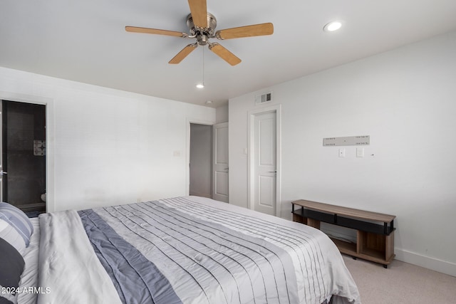 bedroom featuring ceiling fan and light carpet