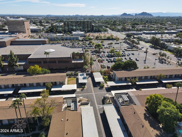 birds eye view of property featuring a mountain view