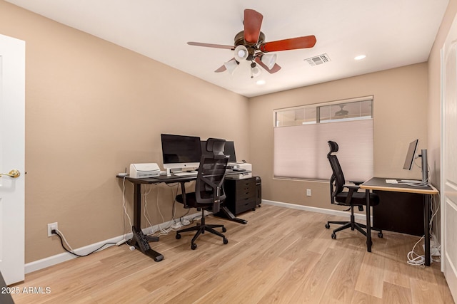 home office featuring baseboards, visible vents, wood finished floors, and recessed lighting