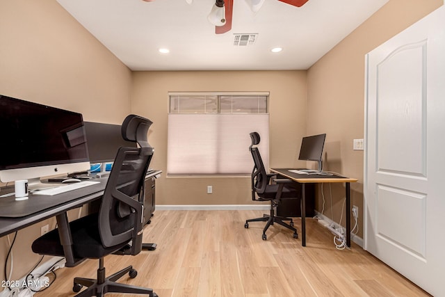 office area featuring visible vents, baseboards, a ceiling fan, light wood-style flooring, and recessed lighting