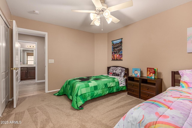 bedroom featuring carpet, baseboards, and ceiling fan