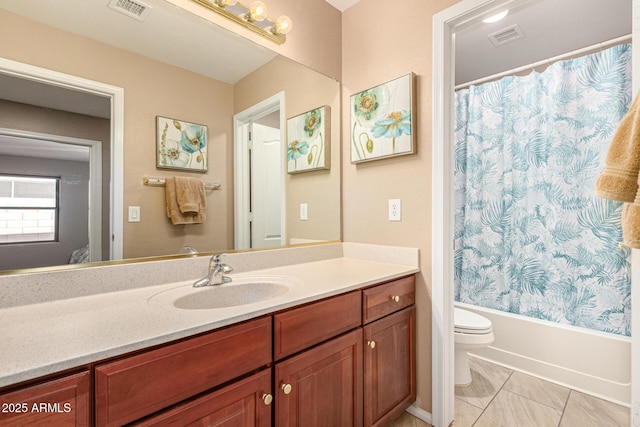 bathroom featuring toilet, visible vents, shower / bath combination with curtain, and vanity