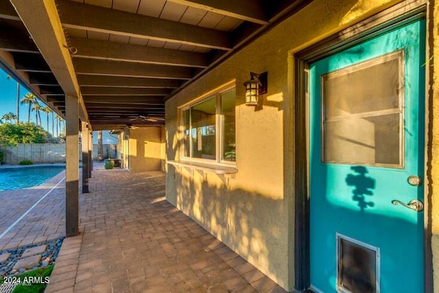 view of patio / terrace with a fenced in pool