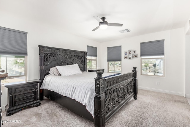 2640 N Heritage St, Buckeye, AZ 85396 - carpeted bedroom with baseboards, visible vents, and a ceiling fan