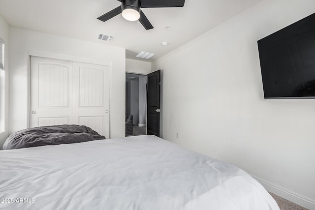 2640 N Heritage St, Buckeye, AZ 85396 - carpeted bedroom featuring baseboards, visible vents, a closet, and a ceiling fan