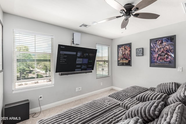 2640 N Heritage St, Buckeye, AZ 85396 - bedroom with baseboards, visible vents, ceiling fan, and carpet