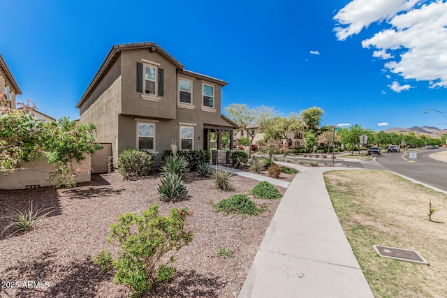 2640 N Heritage St, Buckeye, AZ 85396 - rear view of house with stucco siding