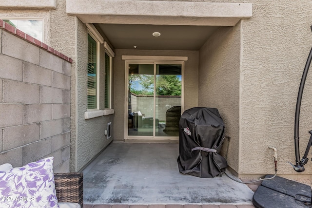 2640 N Heritage St, Buckeye, AZ 85396 - entrance to property featuring stucco siding and a patio