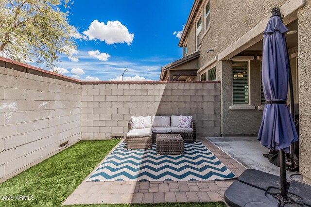 2640 N Heritage St, Buckeye, AZ 85396 - view of patio featuring an outdoor living space and a fenced backyard