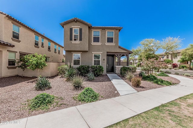 2640 N Heritage St, Buckeye, AZ 85396 - view of front of home featuring a tiled roof and stucco siding