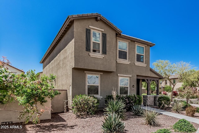 2640 N Heritage St, Buckeye, AZ 85396 - view of front of property featuring stucco siding and a tiled roof
