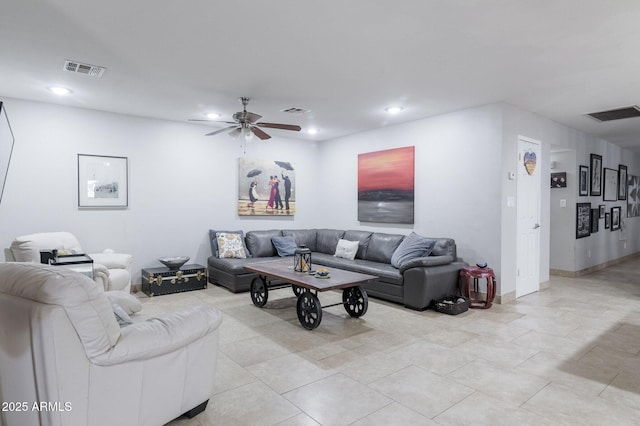 living area with a ceiling fan, recessed lighting, and visible vents