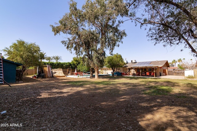 view of yard with a patio area and fence