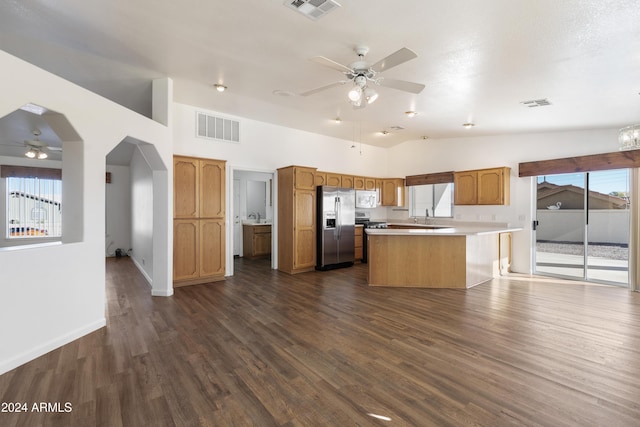 kitchen featuring visible vents, stainless steel refrigerator with ice dispenser, and light countertops