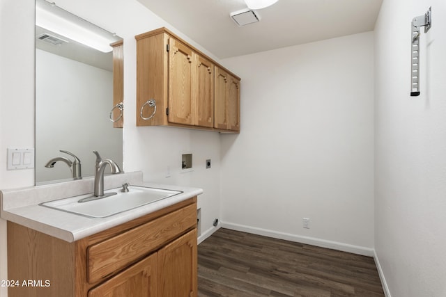 laundry room with cabinet space, visible vents, hookup for an electric dryer, washer hookup, and a sink