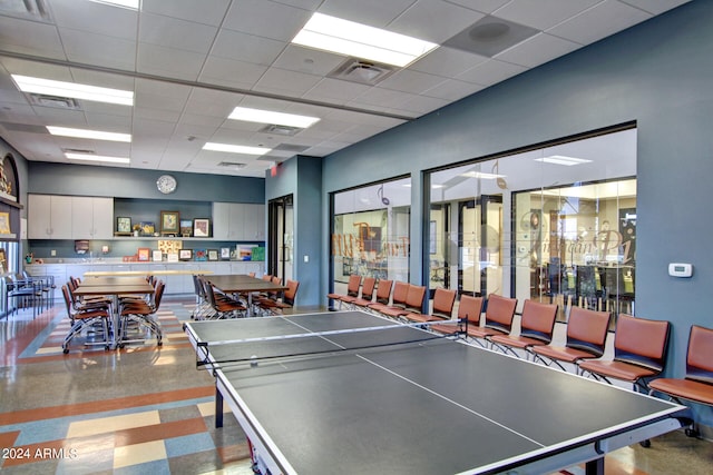 playroom with a drop ceiling