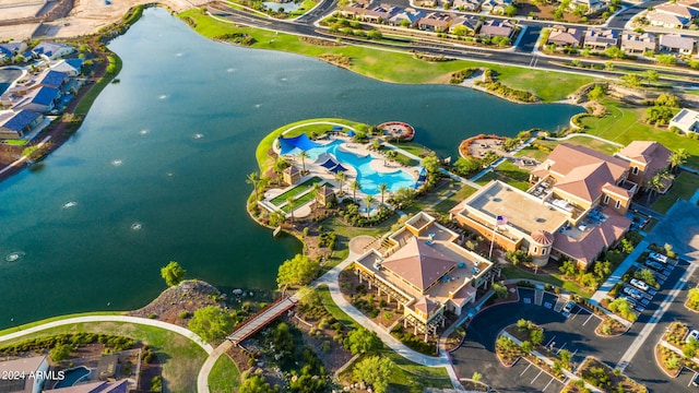 drone / aerial view with a water view