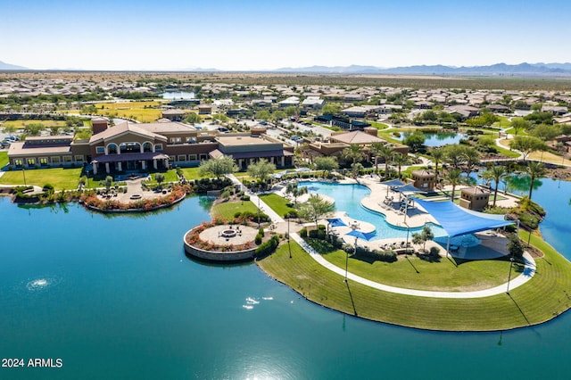 aerial view featuring a water and mountain view