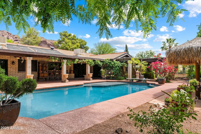 swimming pool with a patio